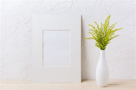 Download Silver frame mockup with ornamental grass in exquisite vase